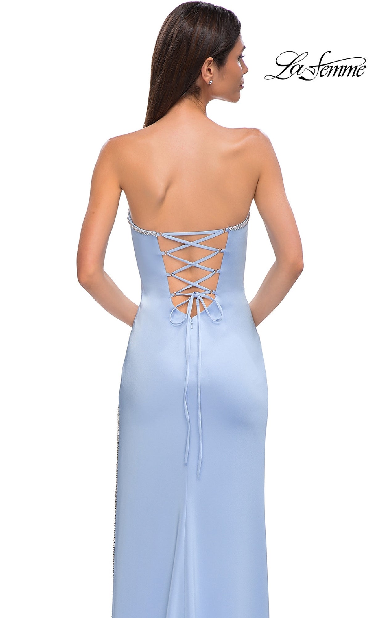 A woman models the Classic Strapless Long Prom Dress: La Femme 32799 in light blue with a lace-up back, standing before a plain white background; the La Femme logo appears in the top right corner.